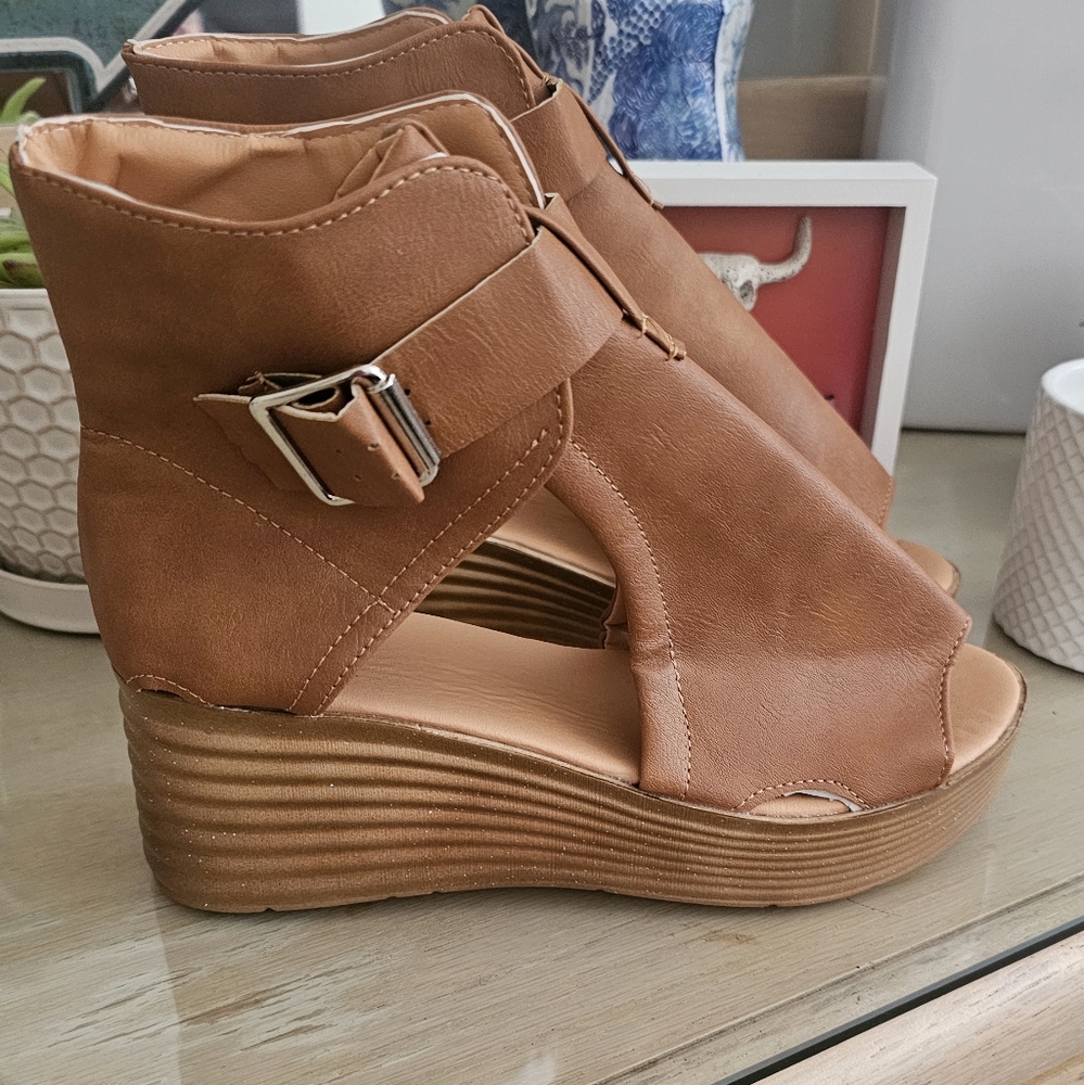 New, never worn tan wedge sandal